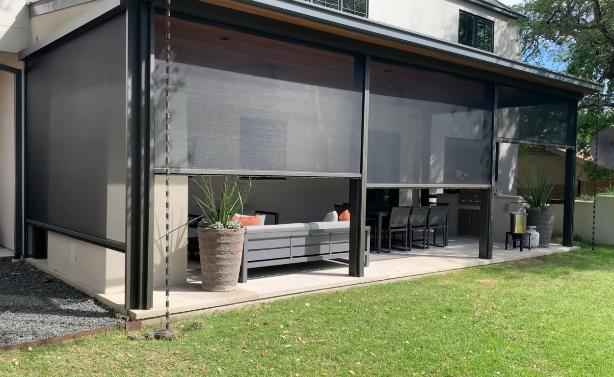 Modern patio cover with retractable screens in Harlingen, TX